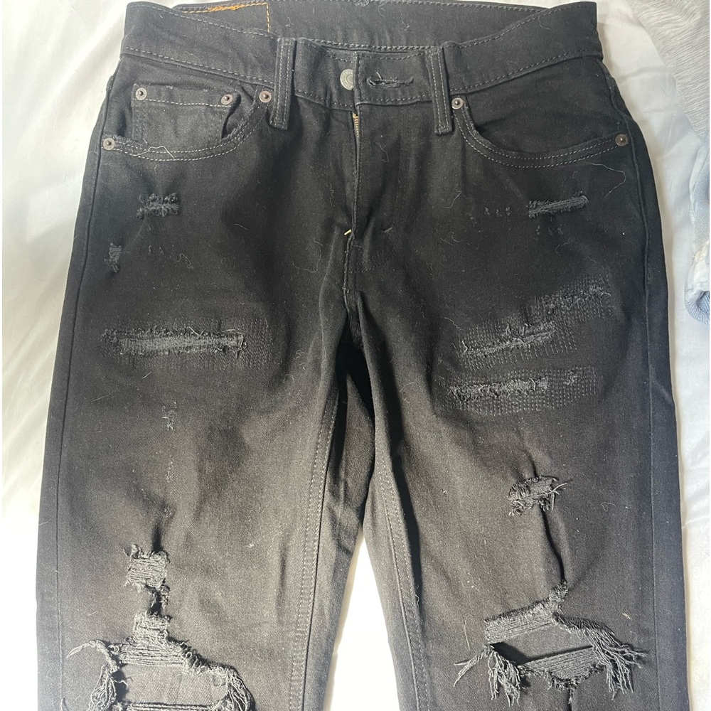 Levi’s distressed black jeans (new without tags)